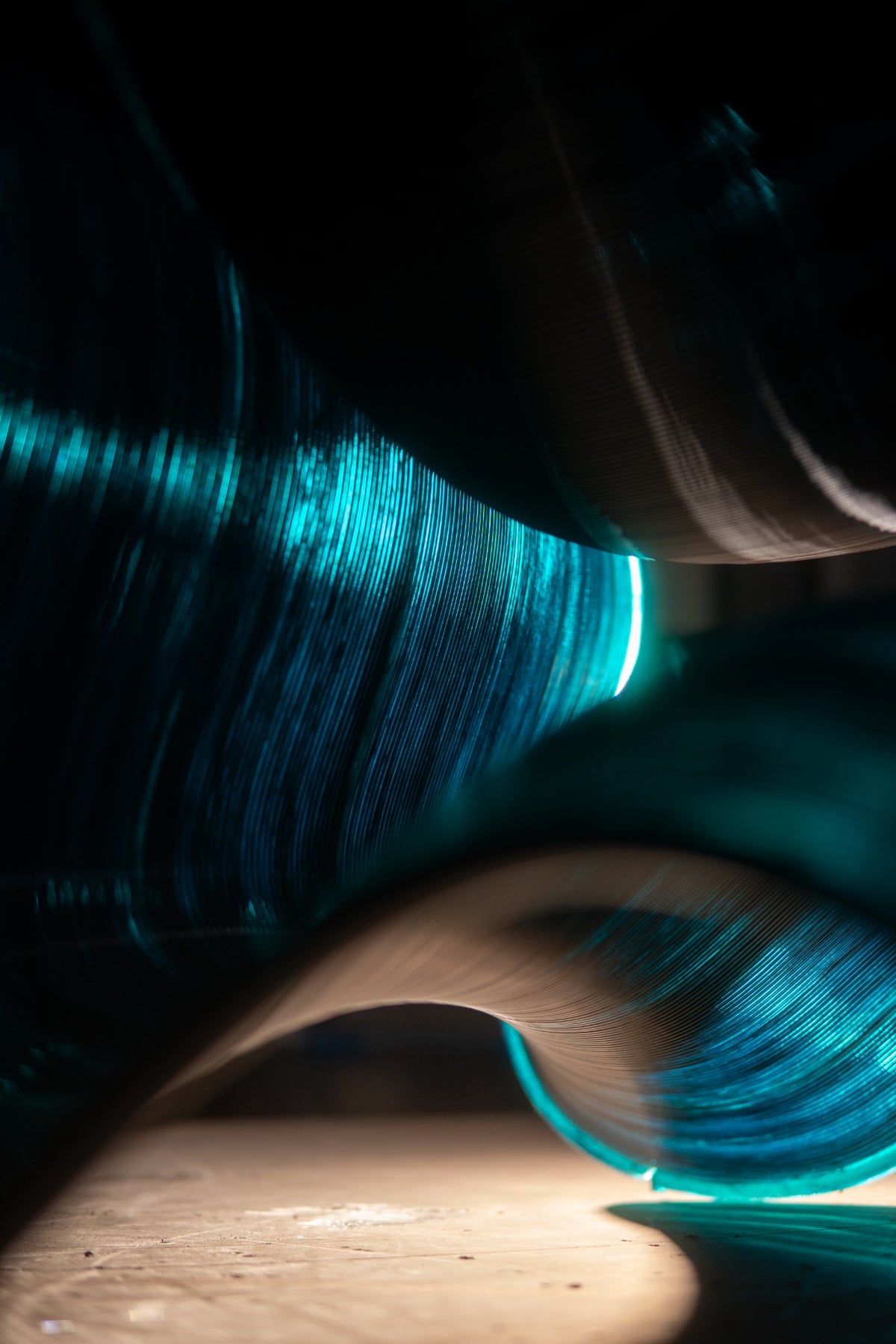 Light moving through the curved layers of a translucent printed lamp